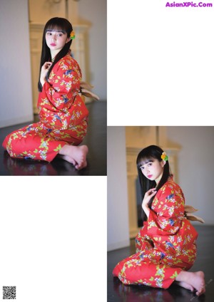 A woman in a red kimono standing in front of a cage.
